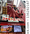 A giant octopus sign at the Konamon Museum, a Dotonbori specialty takoyaki shop 136282187