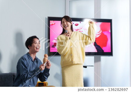 Couple on a karaoke date Couple on a karaoke date 136282697