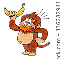 Monkey character holding a banana 136282941