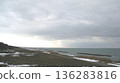 Snow-covered coastline and the Sea of Japan bathed in winter sunlight 136283816