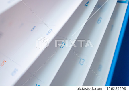 Abstract blur calendar page flipping sheet close up background business schedule planning appointment meeting concept Abstract blur calendar page flipping sheet close up background business schedule planning appointment meeting concept 136284398