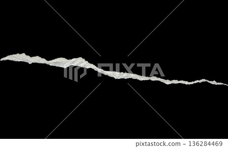 Ripped torn paper edges isolated on black background 136284469