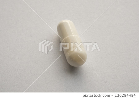 White medicine pill capsule on white background White medicine pill capsule on white background 136284484