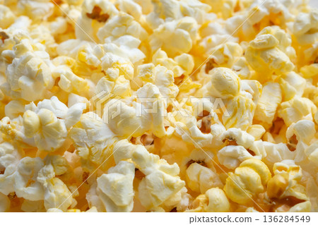 Tasty popcorn close up background top view 136284549