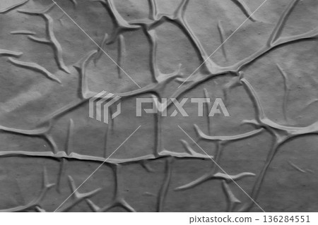Gray crumpled and creased plastic poster texture background 136284551
