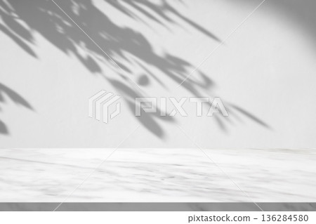 Marble table with tree shadow drop on white wall background for mockup product display 136284580