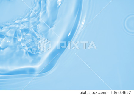 Abstract transparent water shadow surface texture natural ripple on blue background Abstract transparent water shadow surface texture natural ripple on blue background 136284697