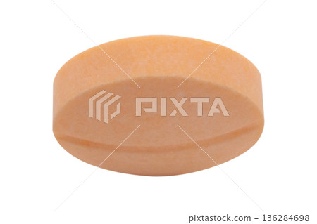 Orange medicine pill tablet isolated on white background Orange medicine pill tablet isolated on white background 136284698