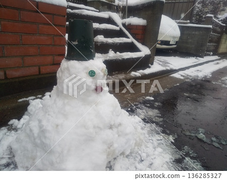 A snowman made from accumulated snow A snowman made from accumulated snow 136285327