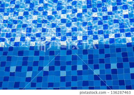 Blue Swimming Pool Tiles with Water Ripples and Light Reflection Blue Swimming Pool Tiles with Water Ripples and Light Reflection 136287463