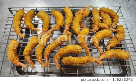 Golden Crispy Deep-Fried Breaded Shrimp or Ebi Fry on Metal Cooling Rack 136288348