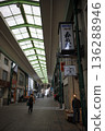 Walking through the arcade 136288946