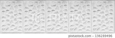 High contrast white plaster texture with deep embossed stone relief and vertical architectural segments 136289496