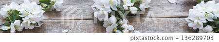 White apple tree blossoms on rustic wooden background panoramic banner White apple tree blossoms on rustic wooden background panoramic banner 136289703