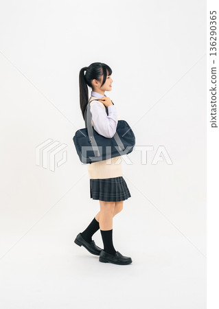 Full-body photo of a female student in a walking uniform Full-body photo of a female student in a walking uniform 136290365