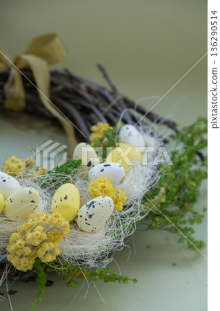 Handmade Easter wreath festive yellow egg decorations. Traditional holiday preparation craft creative decor. Sustainable responsible holiday gift workshop creation. Copy space Simple ideas Handmade Easter wreath festive yellow egg decorations. Traditional holiday preparation craft creative decor. Sustainable responsible holiday gift workshop creation. Copy space Simple ideas 136290514