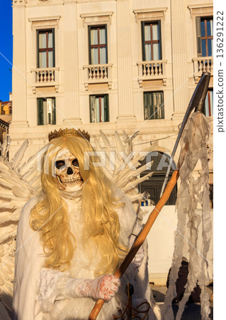 Person dressed as Mrs. Death during the Carnival of Venice, Italy 136291222