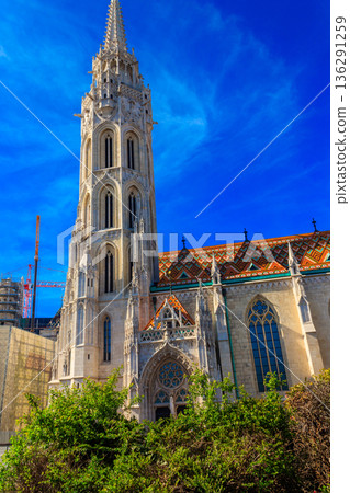 Church of the Assumption of the Buda Castle, more commonly known as the Matthias Church, is a Catholic church located in the Holy Trinity Square, Budapest, Hungary Church of the Assumption of the Buda Castle, more commonly known as the Matthias Church, is a Catholic church located in the Holy Trinity Square, Budapest, Hungary 136291259