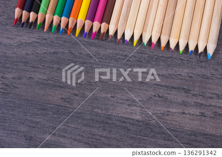 Crayons using for drawing, learning and developing creativity at school. Place for text board Crayons using for drawing, learning and developing creativity at school. Place for text board 136291342