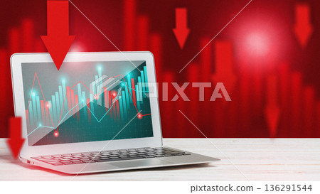 Stock market goes down as shown on laptop screen with red arrows and graphs in the background Stock market goes down as shown on laptop screen with red arrows and graphs in the background 136291544