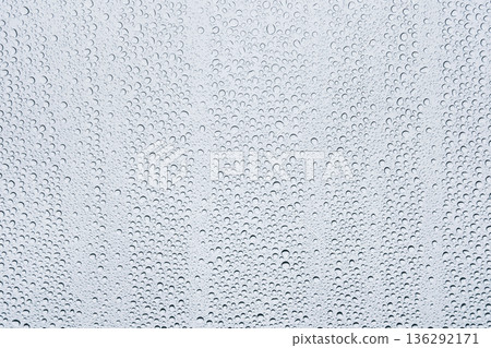 Image of raindrops on window glass Image of raindrops on window glass 136292171
