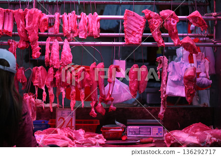 Pork sold at a butcher shop in the Hong Kong market. Higher and more expensive than beef and chicken. Chinese love pork Pork sold at a butcher shop in the Hong Kong market. Higher and more expensive than beef and chicken. Chinese love pork 136292717
