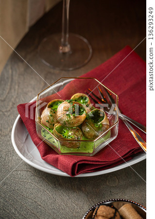 Escargot snails with garlic herb butter Escargot snails with garlic herb butter 136293249