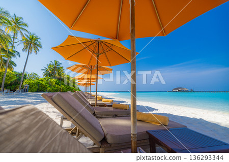 Beach resort chairs umbrella ocean view sandy shore stunning exotic location tropical island summer vacation wallpaper background Beach resort chairs umbrella ocean view sandy shore stunning exotic location tropical island summer vacation wallpaper background 136293344