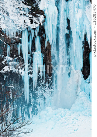 Pale-white glittering icefall 136293470