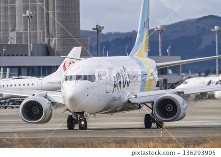 Sendai Airport in winter, airplane taxiing, Natori City, Miyagi Prefecture 136293905