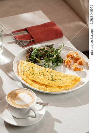 Breakfast omelette with shrimp salad and coffee Breakfast omelette with shrimp salad and coffee 136294042