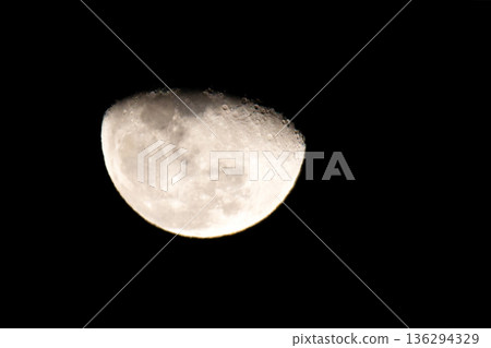 Moon copy space (taken with a telephoto lens) Moon copy space (taken with a telephoto lens) 136294329