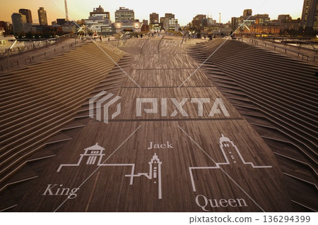 The wooden deck of the Osanbashi International Passenger Terminal in Yokohama at dusk The wooden deck of the Osanbashi International Passenger Terminal in Yokohama at dusk 136294399