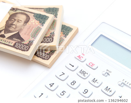 Money and calculator Money and calculator 136294602