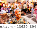 Summer festival, boy dancing wearing a Hyottoko mask 136294894