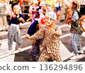 Summer festival, boy dancing wearing a Hyottoko mask 136294896