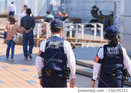 Police officers patrolling the airport, airport security police officers, police officers from the Metropolitan Police Department 136295251