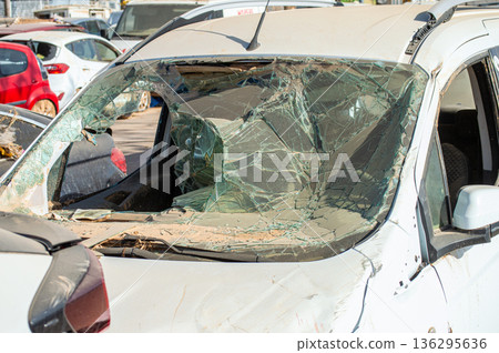 Damaged cars and debris from flooding caused by floods from hurricane DANA in Valencia, Spain  136295636