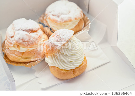 Classic sweets: cream puffs 136296404