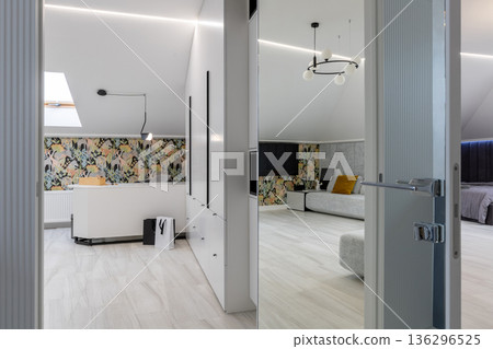 Perspective View of Modern Attic Studio Through Open Door Perspective View of Modern Attic Studio Through Open Door 136296525