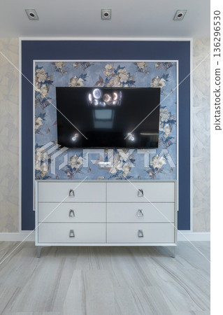 Symmetrical Bedroom Interior with TV and White Dresser Symmetrical Bedroom Interior with TV and White Dresser 136296530