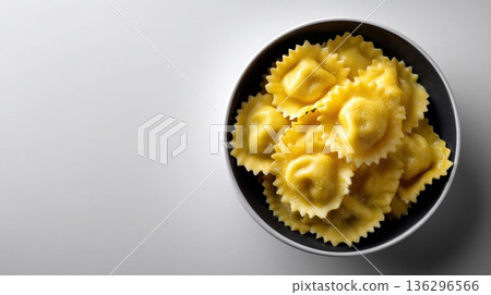 Ravioli pasta served in dark round bowl 136296566