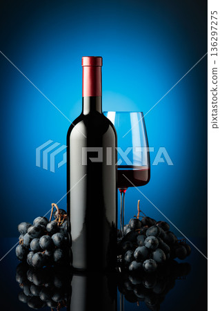 Red wine and juicy blue grapes. Red wine and juicy blue grapes. 136297275