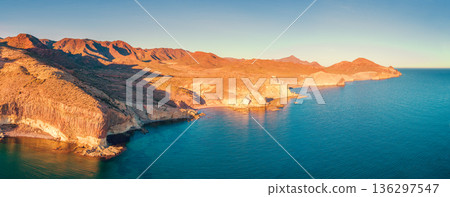 Rock in the sea Aerial view. Natural Park of Cabo de Gata Nijar. Almeria, Andalucia, Spain 136297547