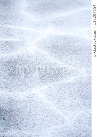 Texture of thin snow on asphalt Texture of thin snow on asphalt 136297554