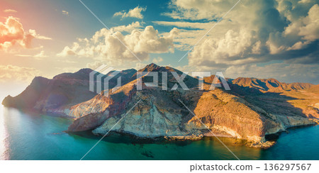 Rock in the sea Aerial view. Natural Park of Cabo de Gata Nijar. Almeria, Andalucia, Spain 136297567