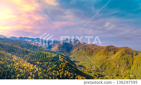 Mountain landscape in early winter during sunset, snowy slope. Ski resort Station Les Monts d'Olmes, France, Europe 136297595