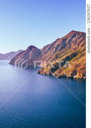 Panorama of the rock in the sea Aerial view. Cabo de Gata-Nijar reserve. Almeria Andalusia Spain Vertical banner 136297627