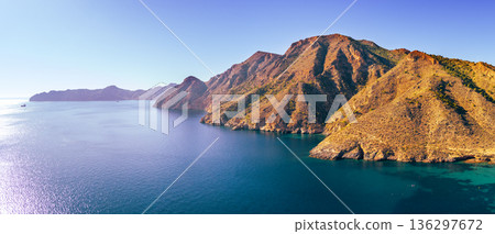 Panorama of the rock in the sea Aerial view. Cabo de Gata-Nijar reserve. El Portus, Almeria Andalusia Spain Horizontal banner 136297672