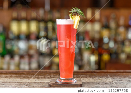 Cocktail singapore sling on a background of a bar rack 136297768